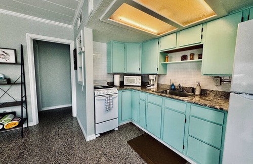 Independence Square Apartment | Private Beach Front- Sandy Toes, Sunsets, and Sunshine