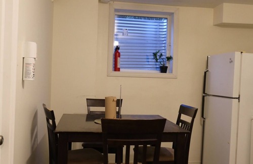 Sheridan House | Private bedroom with a walkout to a nice patio