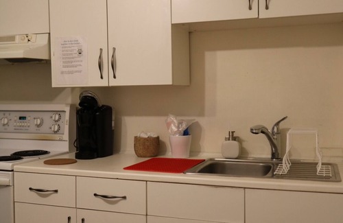 Sheridan House | Private bedroom with a walkout to a nice patio