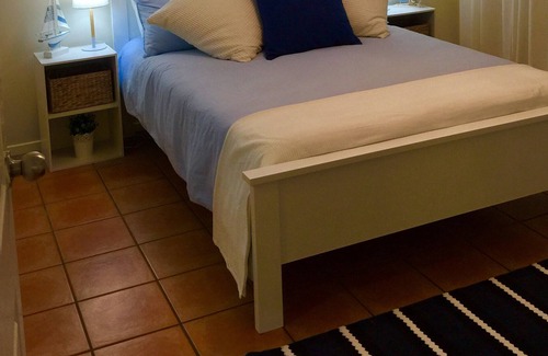 Currumbin Waters House | Private Coastal Retreat: lush tropical gardens, private resort pool w waterfall