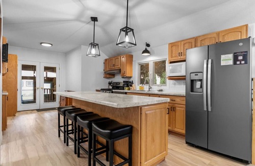 Shawano House | Private Dock! Lakefront! Paddleboards! Firepit