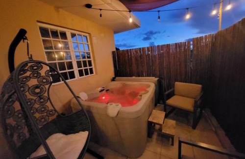 Bucana Apartment | Private Jacuzzi Oasis with Mountain Views and FREE Parking