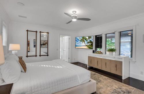 Harbor Beach House | Private neighborhood Heated Pool Lush Surroundings Harbor Key RESlDENCES