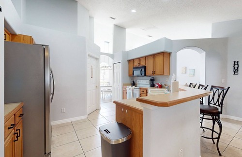 Orange Tree House | Private pool home with attached spa, screened lanai, & on-site tennis/pickleball