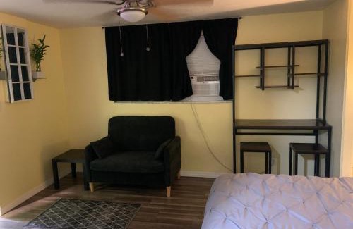 Pinellas Park House | Private suite with small kitchen private bathroom entrance porch and driveway