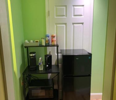 Pinellas Park House | Private suite with small kitchen private bathroom entrance porch and driveway
