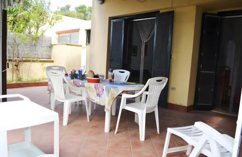 Torre dell'Orso House | Pt63 Casa a T dell Orso con veranda