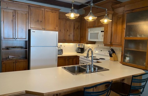 Mont-Tremblant Condo | P’tit Bonheur Luxury Condominium with Rustic Style