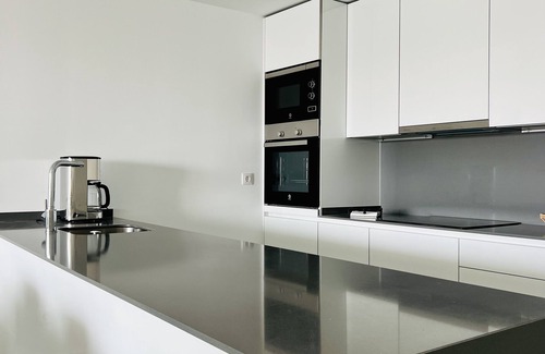 Alcorrin Apartment | Pure South – Modern Elegance with Sea View