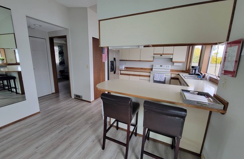 Belfair House | Quaint beachfront home with bulkhead and swim float.