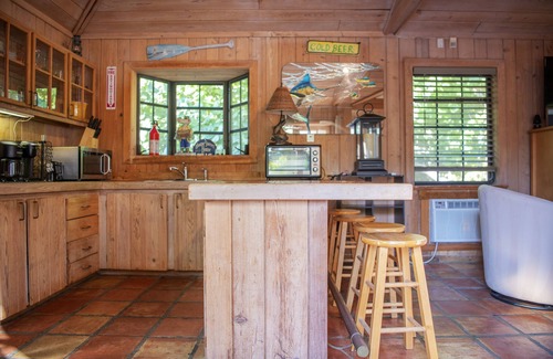Boynton Beach Apartment | Quaint Pool House in Tropical Setting