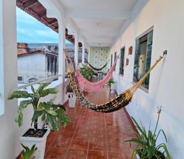 Alvorada House | Quarto triplo com banheiro compartilhado