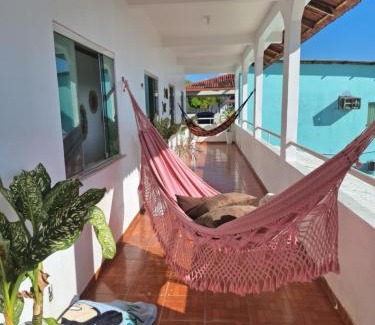 Alvorada House | Quarto triplo com banheiro compartilhado