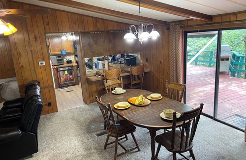 Flint Creek House | Quiet cabin in the woods w/access to pools, river, & lakes in gated community!