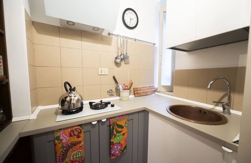 Rione VII Regola Apartment | Quiet Piazza Navona Apartment with Courtyard Patio, Lift & Rooftop Views