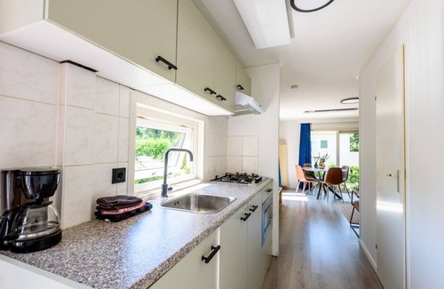 Krachtighuizen Ski Chalet | Quietly located cozy chalet in the Veluwe.