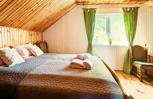 gmina Stary Dzierzgon House | Różany Ogród - dom pod lasem, z widokiem na jezioro i kominkiem, rowery, łódka, rowerek wodny