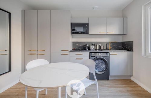 Quartier Exposition-Bajatiere Apartment | R'Appart L'atelier Voyageur S1