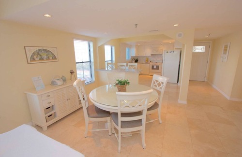 Indian Rocks Beach Condo | Rare Beachfront Ground Floor, Patio, Pool, Hot Tub, Tennis, W/D, Free Cable & Wi-Fi~108 Reflections
