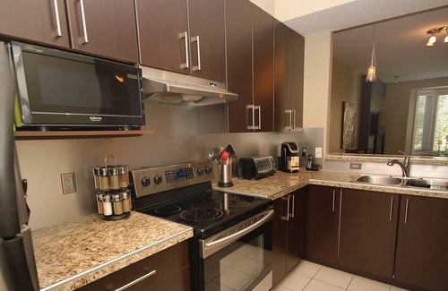 Bridgeland Condo | ** RATE SPECIAL- Luxury 2 Bed VEGAS STYLE - 5 Star Oasis **