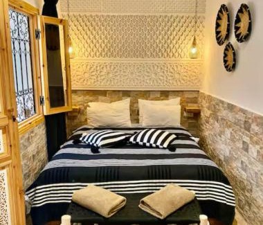 Kasbah House | Ravissant Riad avec 4 suites et une belle terrasse avec bassin sur le toit