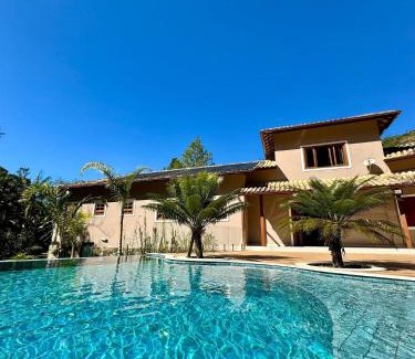 Olaria House | Refúgio em Lumiar: Piscina Aquecida, Área Gourmet e Rio Privado