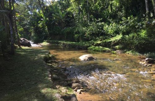Olaria House | Refúgio em Lumiar: Piscina Aquecida, Área Gourmet e Rio Privado
