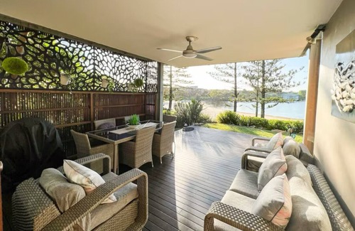 Twin Waters Apartment | Reflections across the waters and resort access