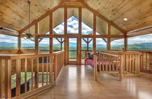 Gatlinburg - Pigeon Forge Cabin | Rejuvenation is a beautiful two-bedroom cabin in Starr Crest Resort.