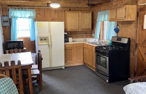 West Branch Cabin | Relax and Play: Lakeside Cabin with Beachfront, Kayaks and Fun-Filled Activities