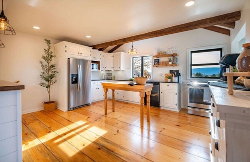 Mifflinburg House | Relax by the pool or in the hot tub with a view!