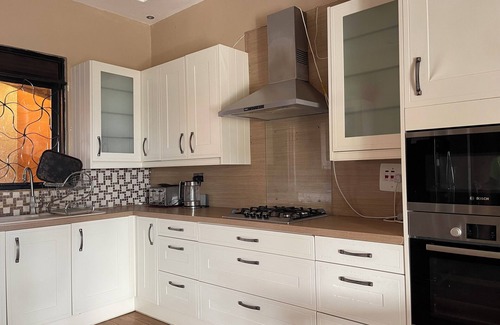 Entebbe House | "Relax in Style: 4BR Lakeside Home with Stunning Views & Luxe Amenities