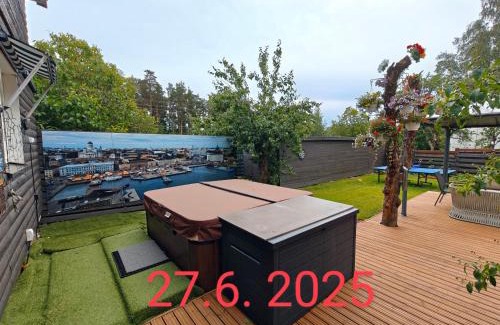 Lantinen District Apartment | Relax & Recharge - a Unique Suite with a Touch of Luxury - Hot Tub and Sauna Inspired Decor #NOT A REAL SAUNA# Easy City Access - direct train 15 min to city