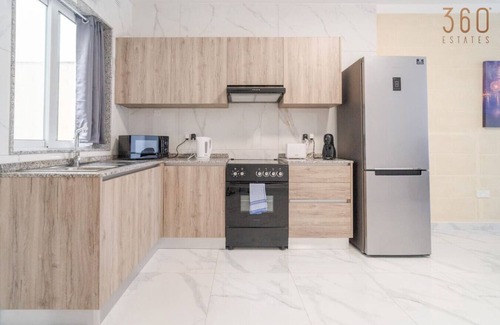 Tarxien Apartment | Relaxed 2BR Home with Backyard & Balconies,Tarxien