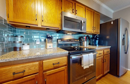 New Braunfels Condo | Remarkable Condo Overlooking the Comal River! RPS 302:Free Tubes with Rental!