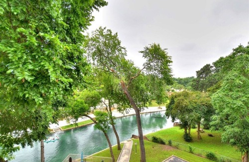 New Braunfels Condo | Remarkable Condo Overlooking the Comal River! RPS 302:Free Tubes with Rental!