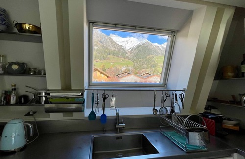 Chateau-d'Oex Apartment | Rentals by Laura - Apartment with fireplace and mountain view