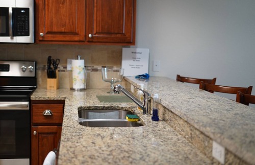 New Smyrna Beach Condo | Resort style amenities in spacious condo with beach access and direct pool view.