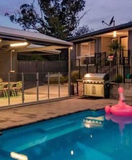 Hughes House | Resort style home pool spa sauna
