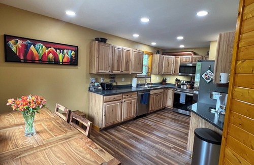 Bear Creek Cabin | Resurrection Peaks Lodge. Lower unit, sleeps 8. Private lot and close to town.