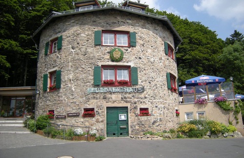 Dipperz Apartment | RHÖN-ANTIK" apartment with wood-burning stove and terrace for barbecuing.