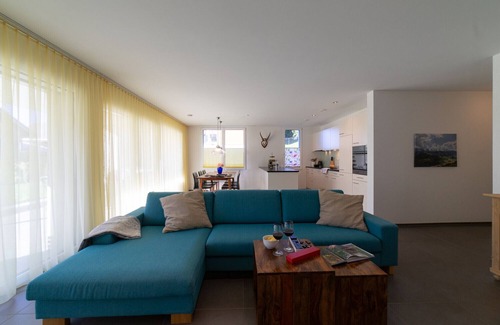 Wildhaus Apartment | Rietgarten - 4.5-room garden flat with mountain view