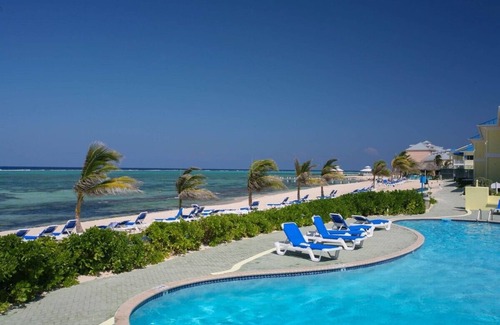 Colliers Bay Condo | Right on the Beach! Ground Floor 2BD/2BA Condo at Castaways Cove in the East End