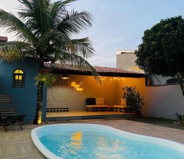 Itaipuacu Apartment | RiqueHouse: Piscina, churrasqueira a 500m da praia