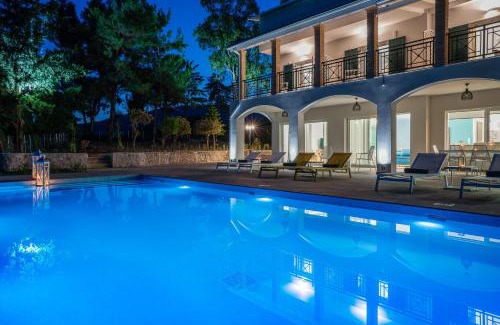 Porto Koukla Villa | Rivazzurra Beachfront Luxury Villa