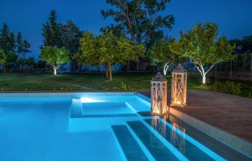 Porto Koukla Villa | Rivazzurra Beachfront Luxury Villa