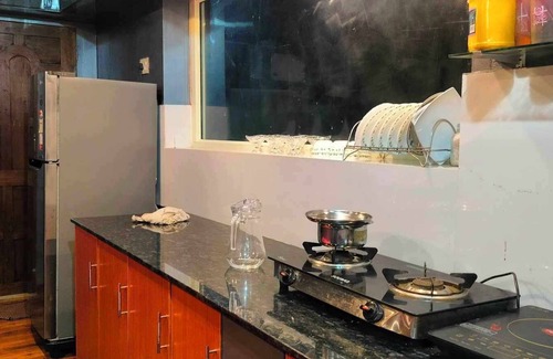 Thalassery Cottage | River view Family Room, A1 Suite-Bar chair, Ac, Kitchen, Wi-Fi