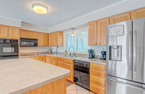 Venetian Way House | Riverfront home with private heated pool, dock, AC & W/D - dog-friendly