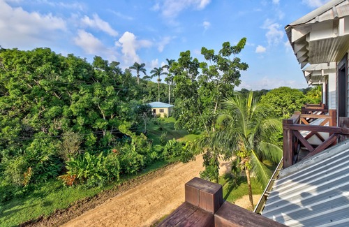 Bullet Tree Falls House | Riverfront Retreat with Balcony, WiFi, Partial AC, Shared Pool