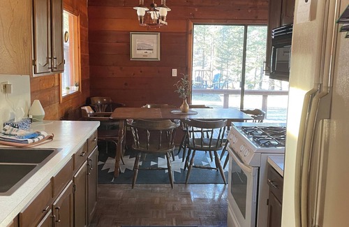 Bragg Creek Cabin | Riverside Bragg Creek Cabin in the Heart of Town